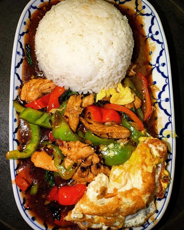 Thai Basil Stir Fry Chicken served with Coconut Rice and fried egg 🤤😋👌Just like how street vendors sell it in Thailand!